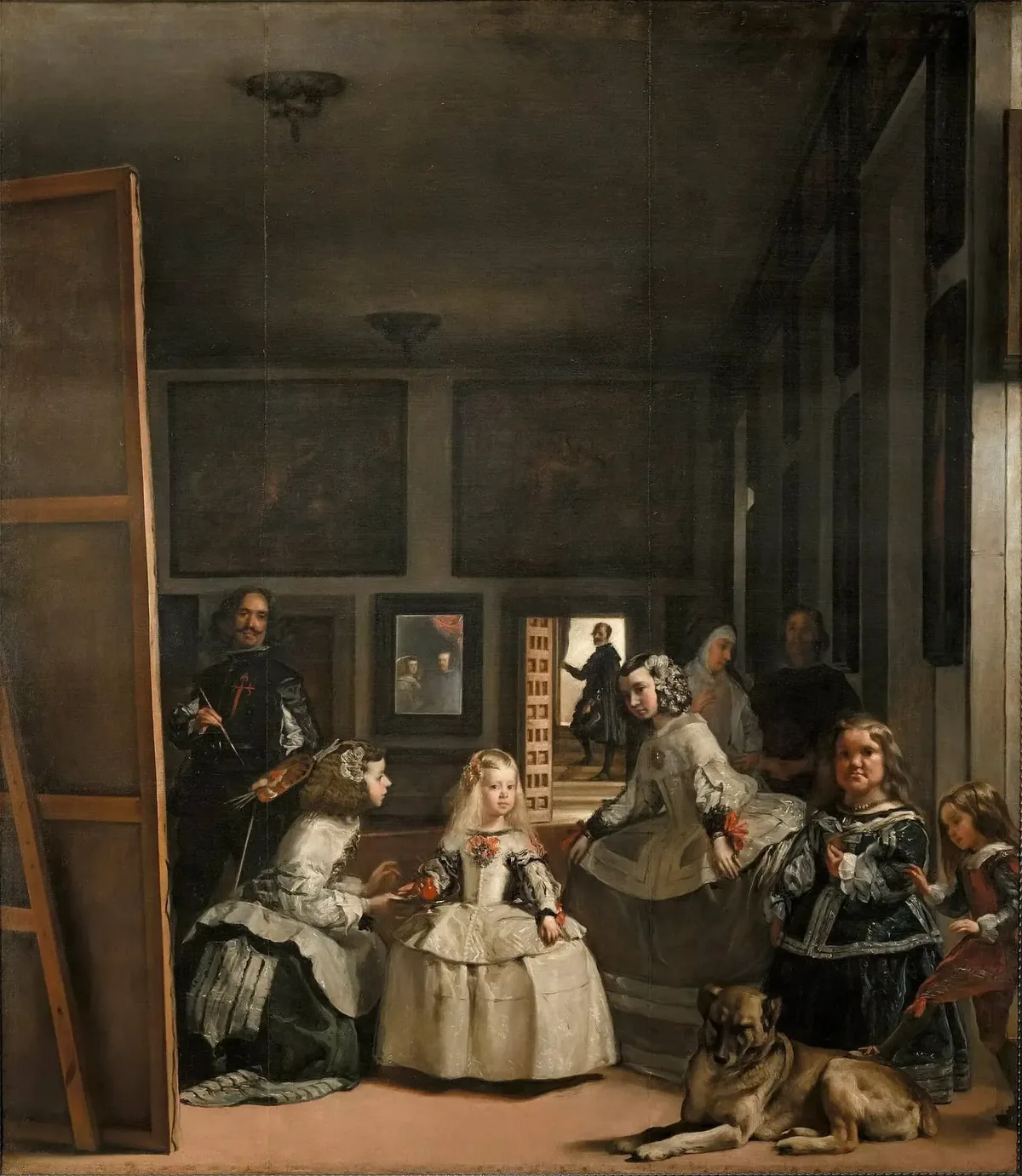 La infanta Margarita en el centro, rodeada de sus damas, una enana, un perro y el propio Velázquez pintando un gran lienzo