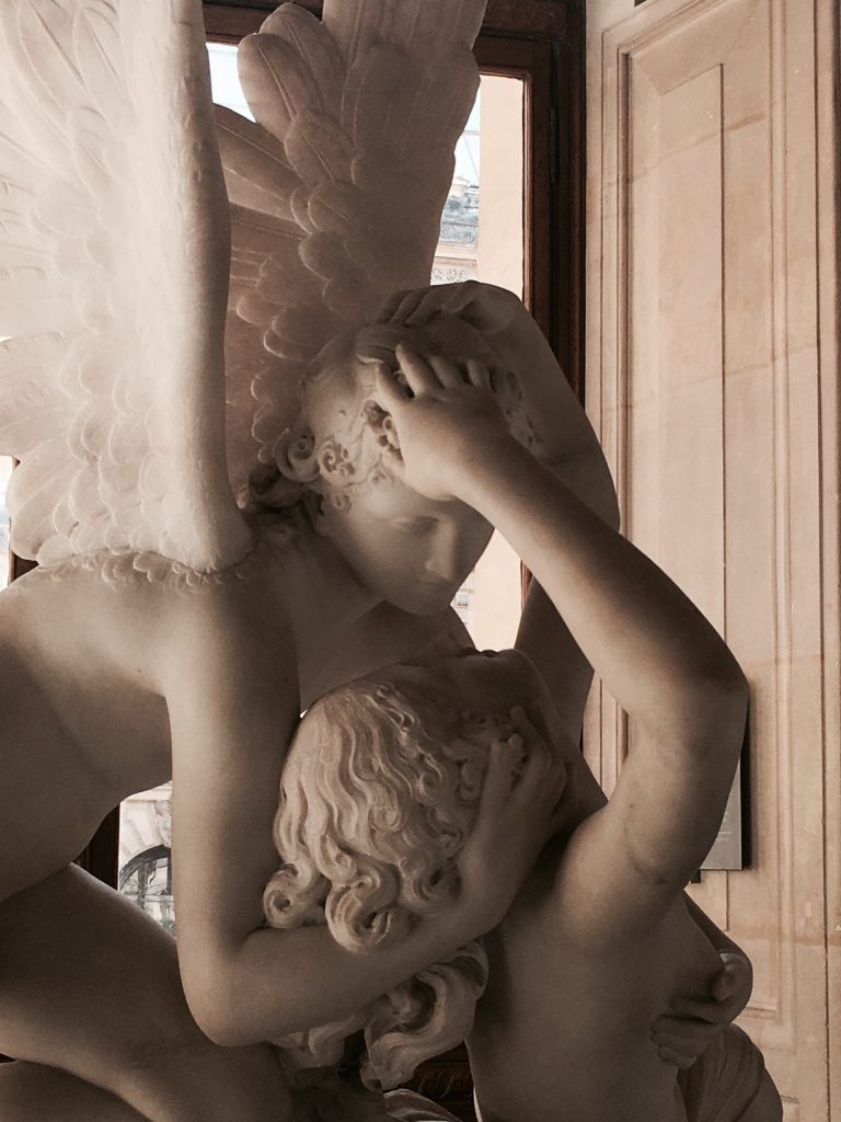 Kiss of love in Louvre Museum